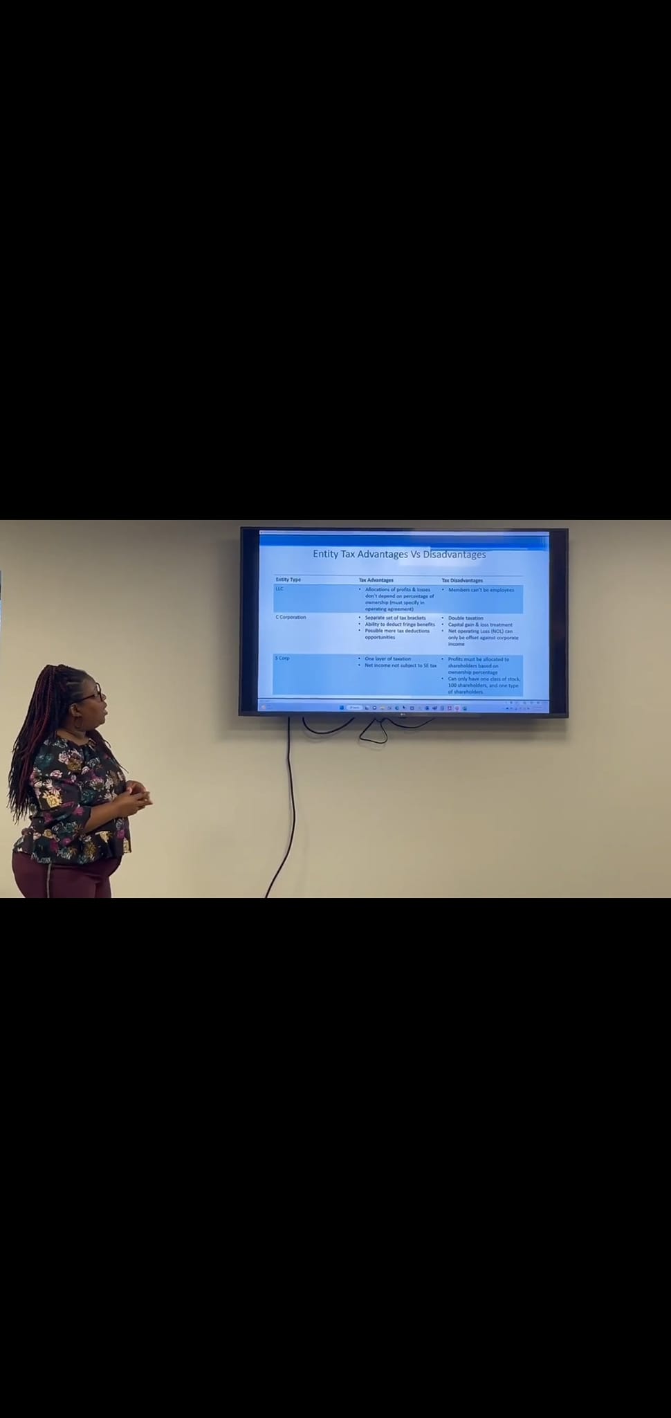Woman presenting tax advantages document
