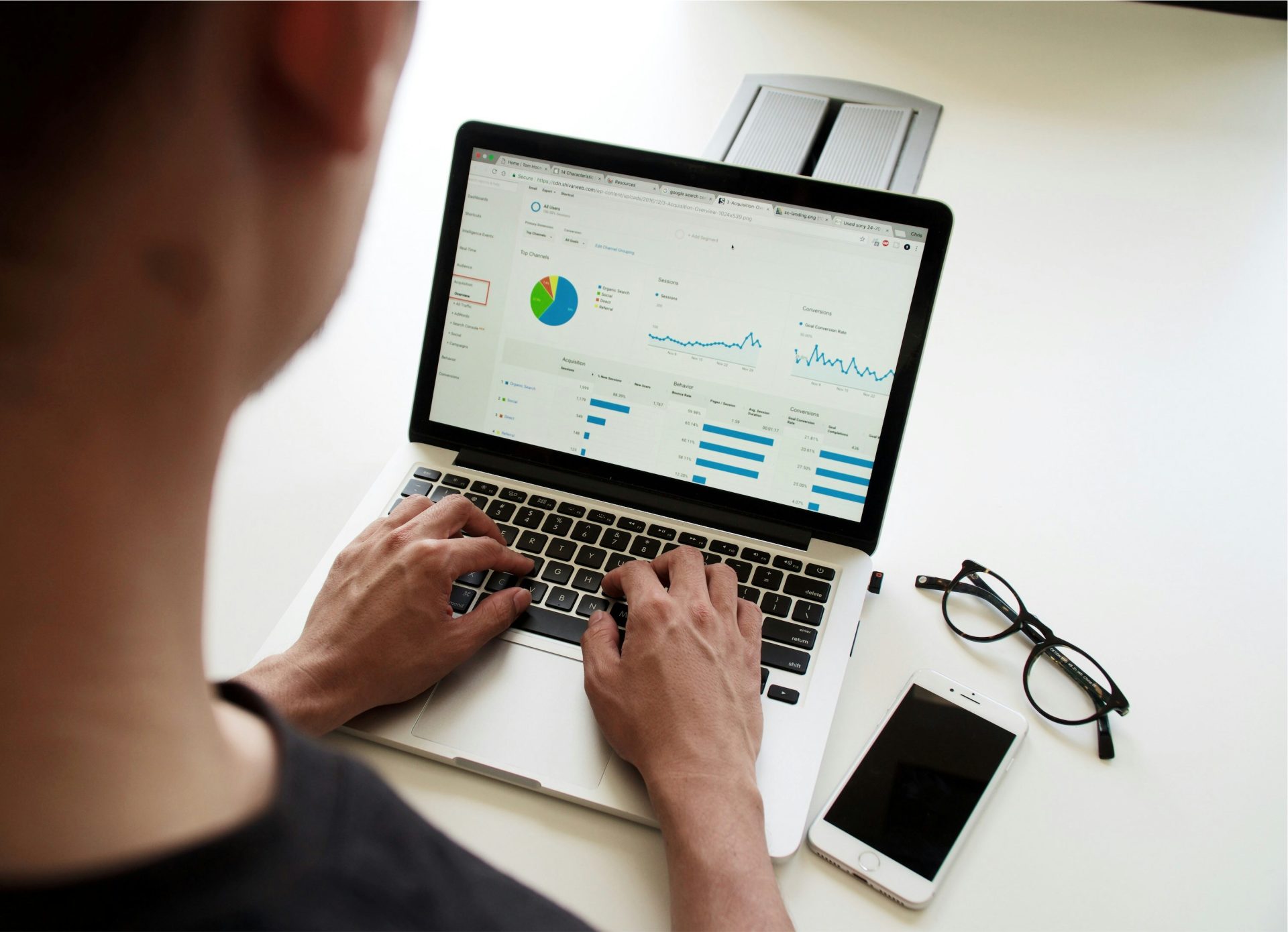 Person using laptop for analytics