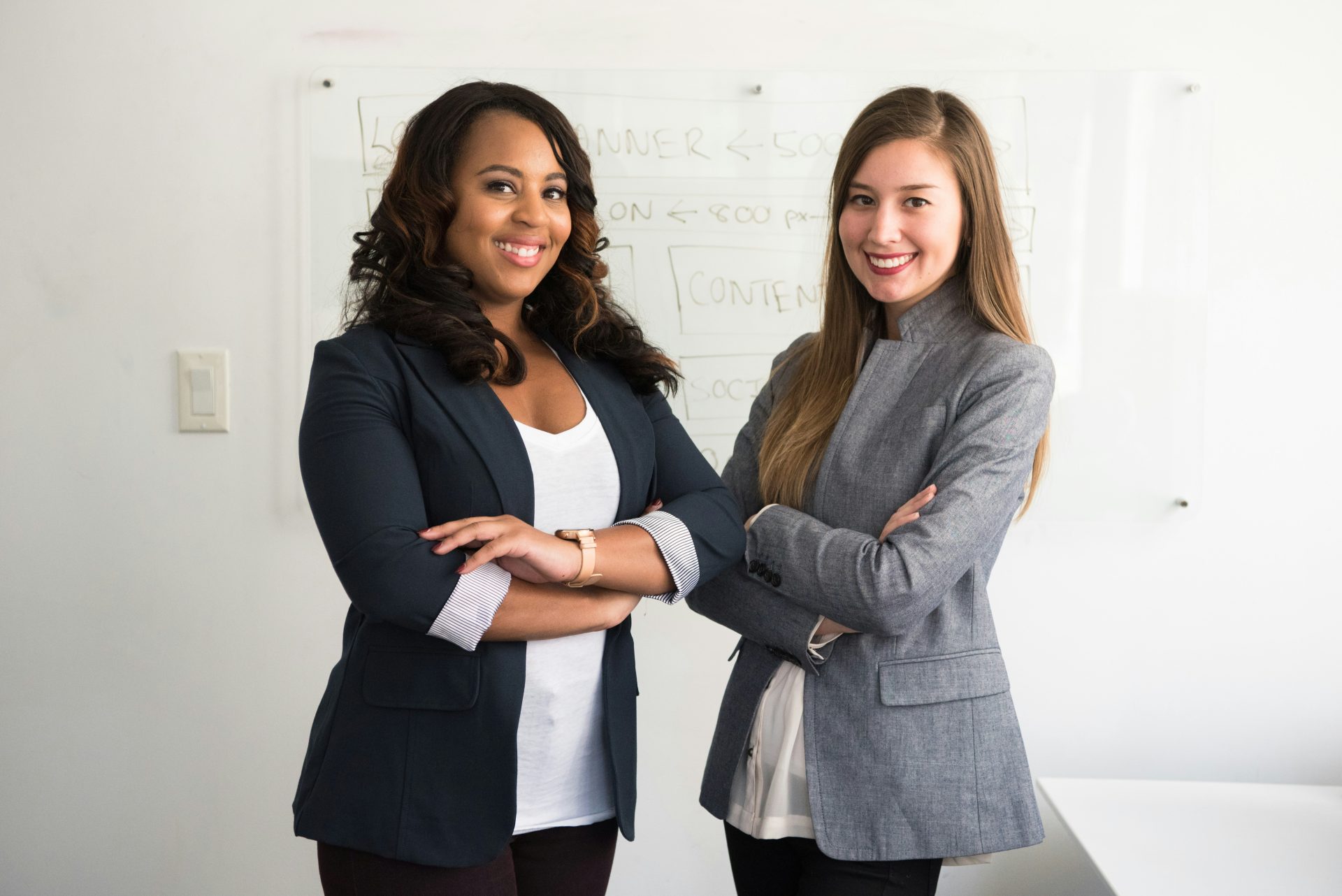 Two women smiling together